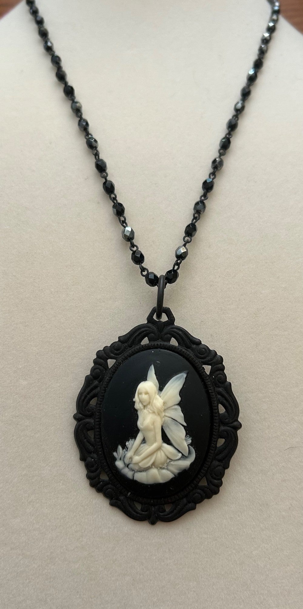 Seated Fairy Cameo Pendant/Brooch with a 22” Jet Black Beaded Chain of faceted beads|879