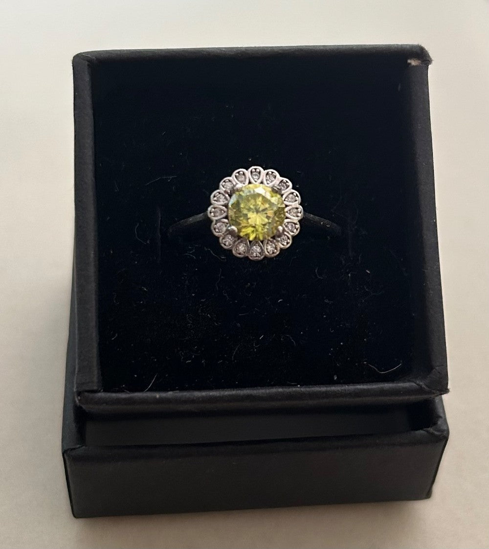 Adjustable Sterling Silver Flower Ring With A Peridot Stone Center|915