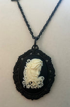 Fanciful Curls Cameo Pendant/Brooch with a 20” Embellished Black Chain|868
